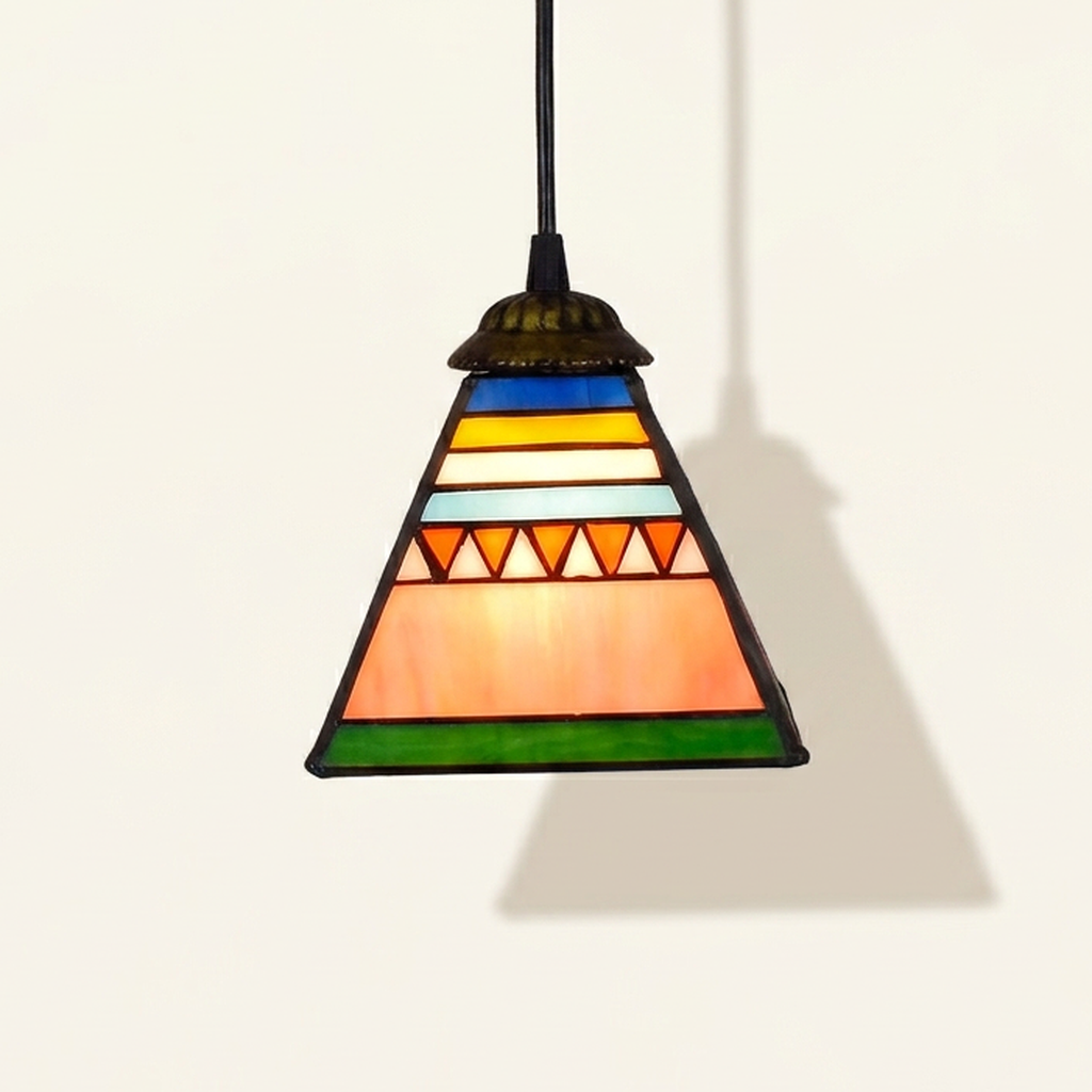 Pyramis, 6 Inch Tiffany-style stained glass pendant light, lit, on a plain ivory studio background