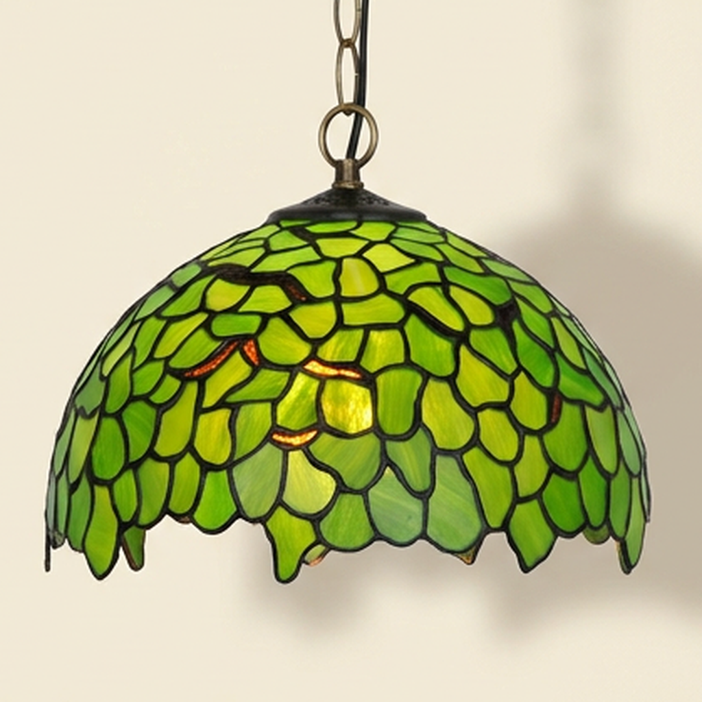 Verdaine, 12 Inch Tiffany-style stained glass pendant light, lit, on a plain ivory studio background