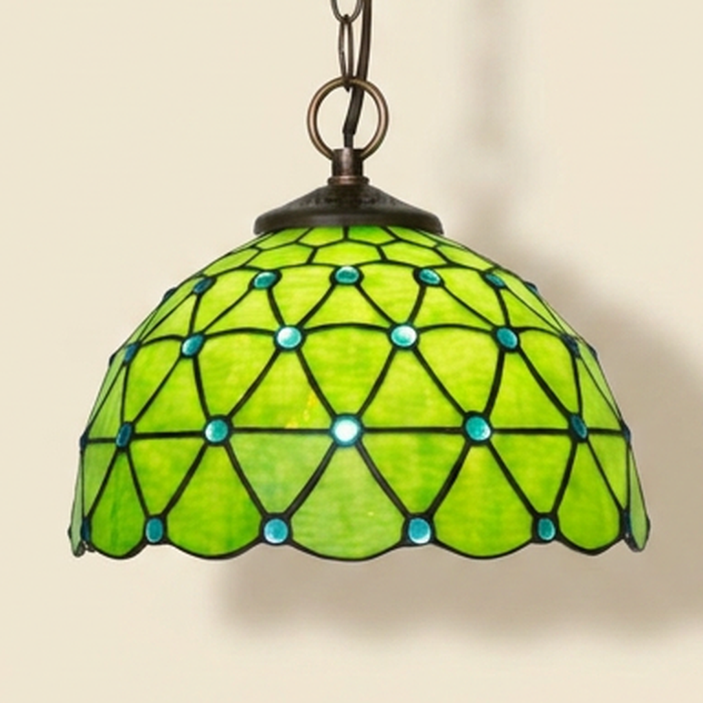 Verdemar, 12 Inch Tiffany-style stained glass pendant light, lit, on a plain ivory studio background