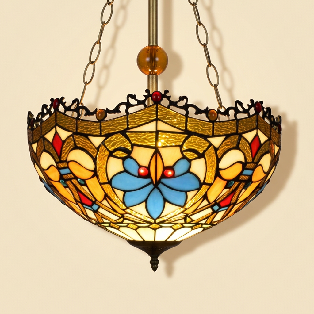 Draconelle, 16 Inch Tiffany-style stained glass pendant light, lit, on a plain ivory studio background