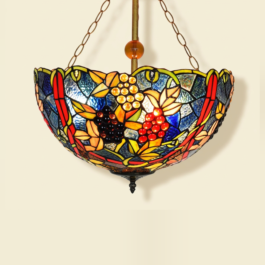 Vendome, 17 Inch Tiffany-style stained glass pendant light, lit, on a plain ivory studio background