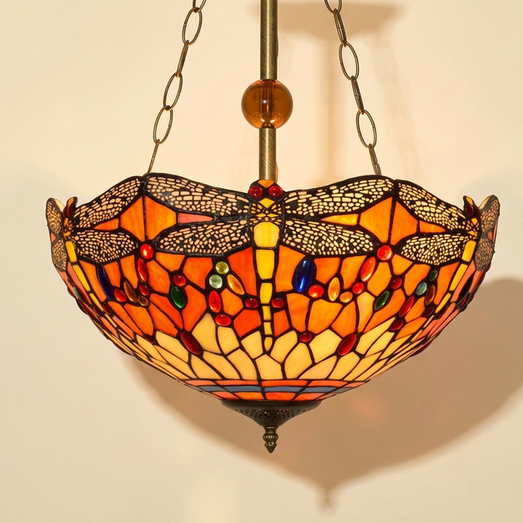 Solene, 16 Inch Tiffany-style stained glass pendant light, lit, on a plain ivory studio background