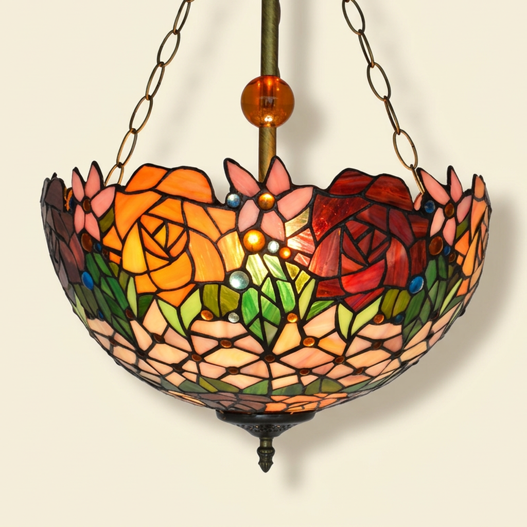 Fleurette, 16 Inch Tiffany-style stained glass pendant light, lit, on a plain ivory studio background