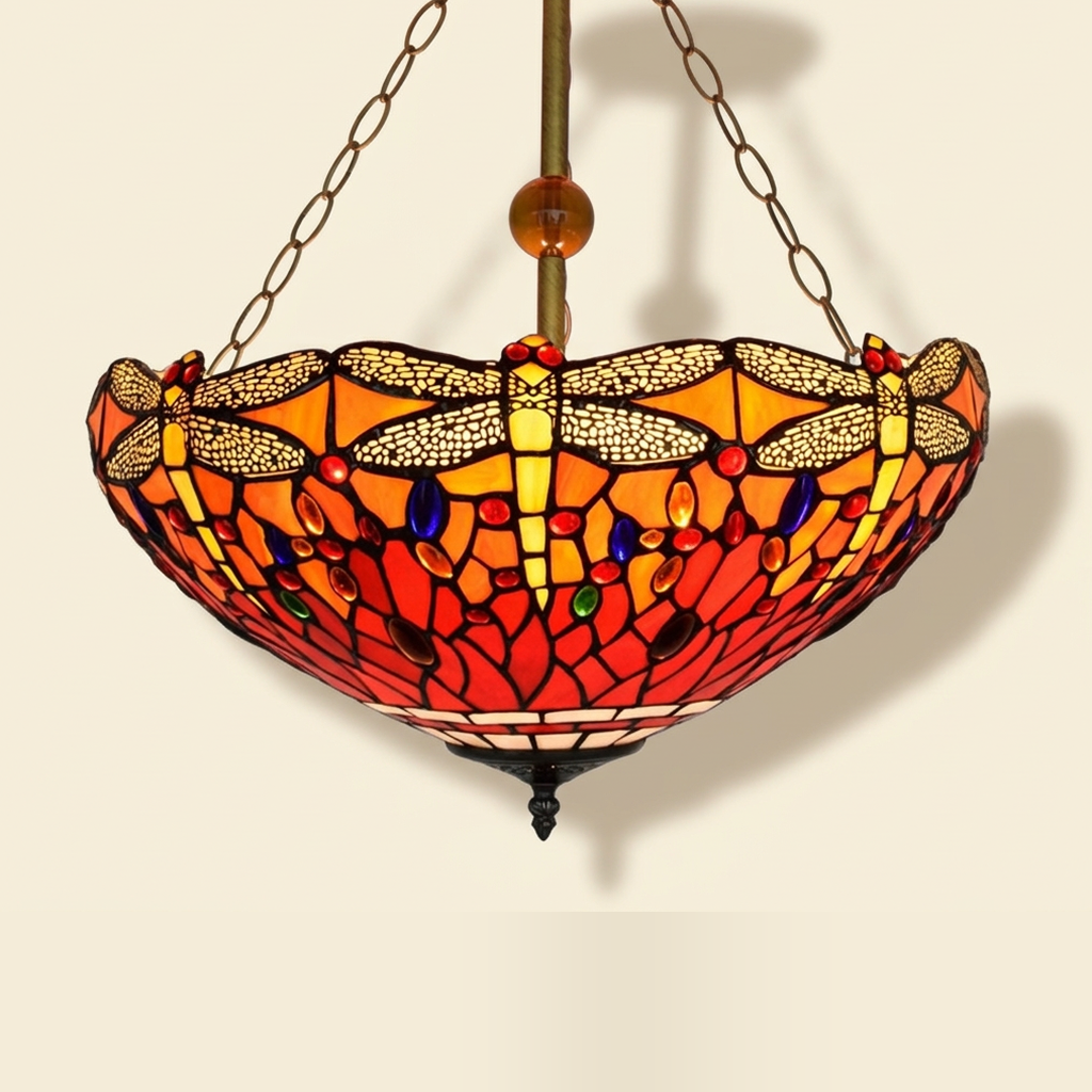 Cinnabar, 18 Inch Tiffany-style stained glass pendant light, lit, on a plain ivory studio background