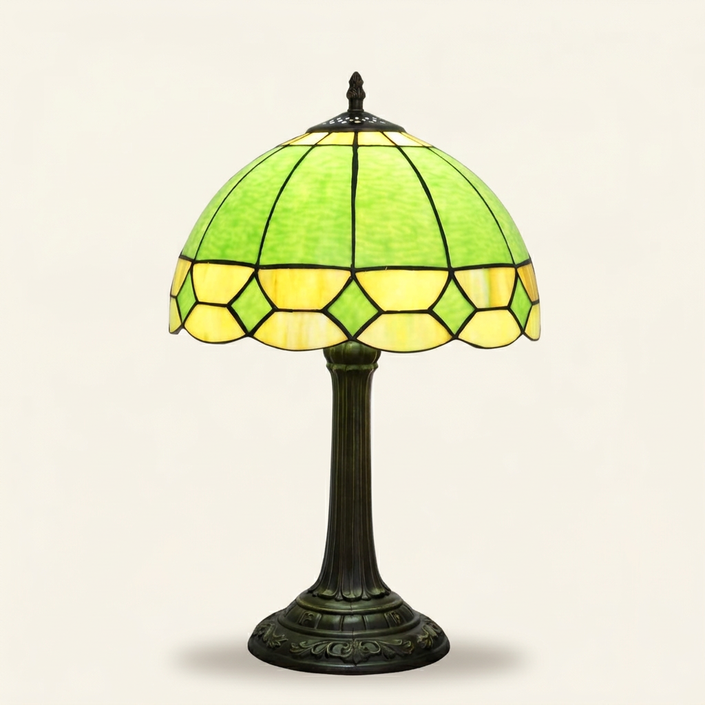 Curvelle 12 Inch Tiffany-style stained glass table lamp, lit, on a plain ivory studio background