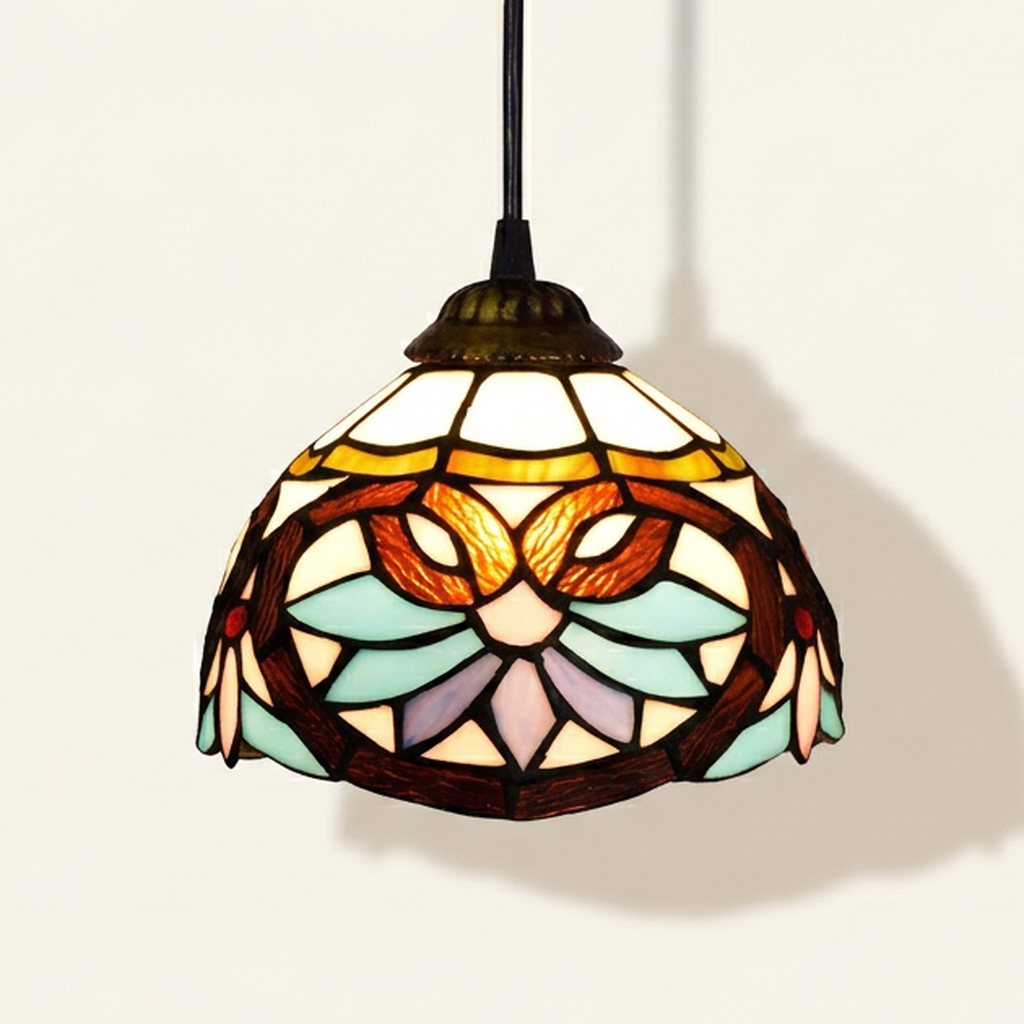Cherielle, 8 Inch Tiffany-style stained glass pendant light, lit, on a plain ivory studio background