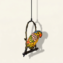 Loriane, 12 Inch - Yellow Tiffany-style stained glass pendant light, lit, on a plain ivory studio background