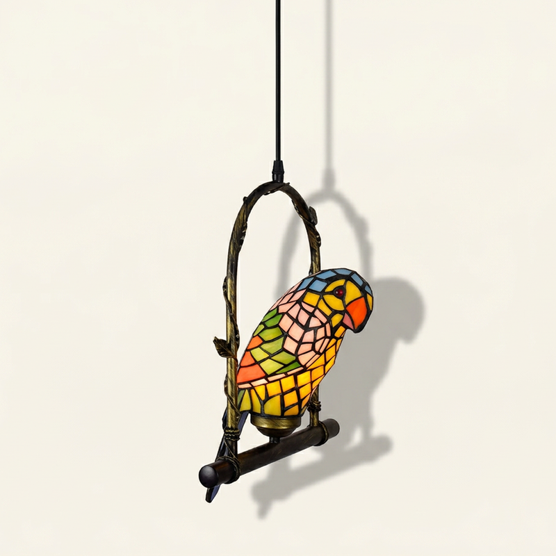 Loriane, 12 Inch - Yellow Tiffany-style stained glass pendant light, lit, on a plain ivory studio background