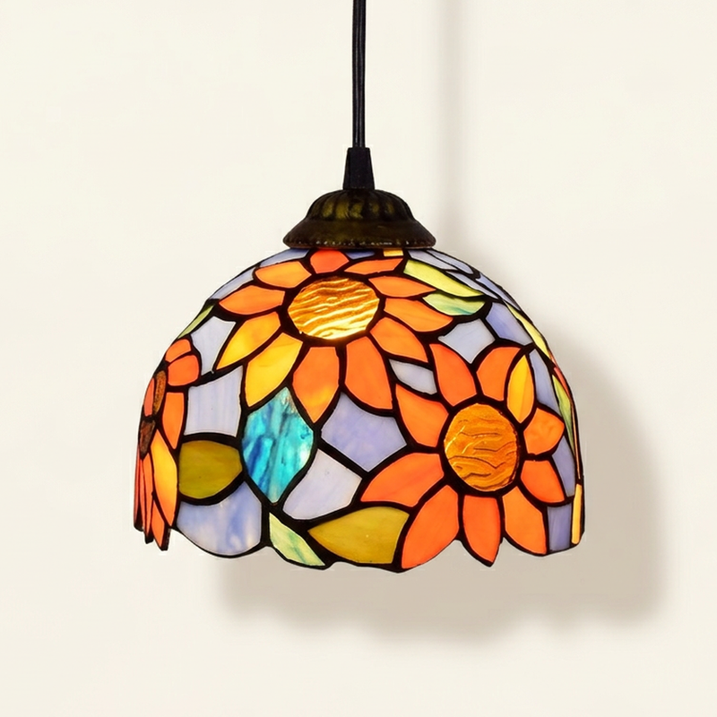 Soleste, 8 Inch Tiffany-style stained glass pendant light, lit, on a plain ivory studio background