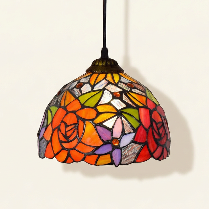 Fleuranne, 8 Inch Tiffany-style stained glass pendant light, lit, on a plain ivory studio background