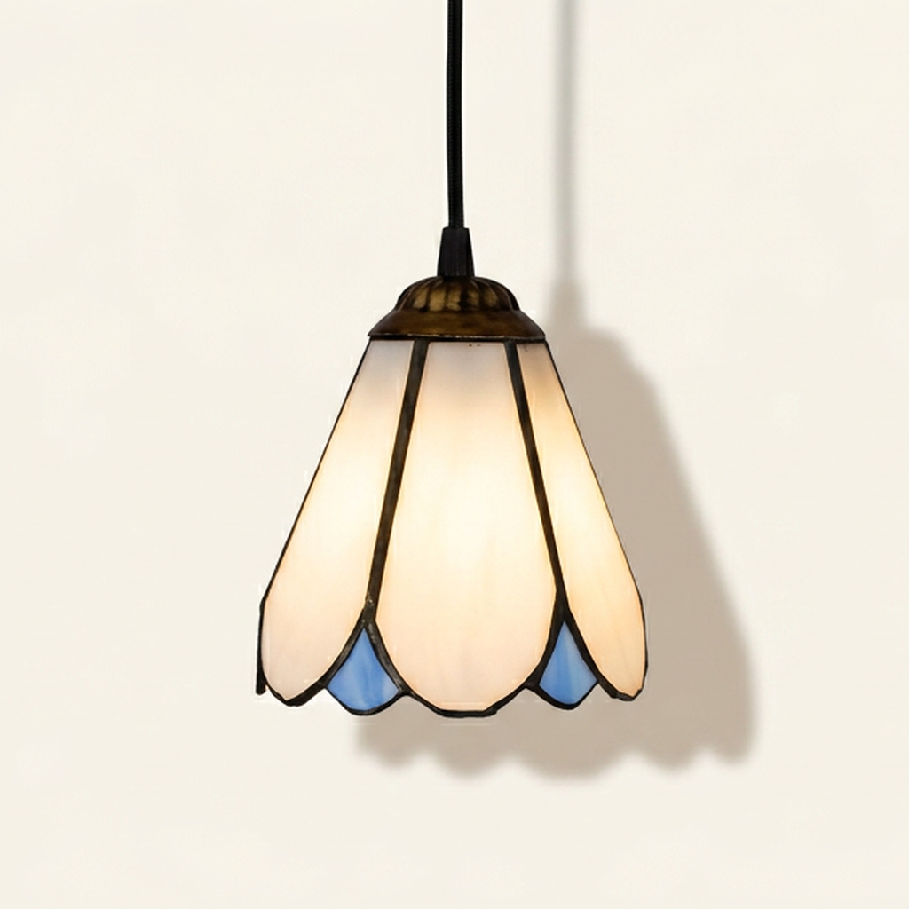 Blanchard, 6 Inch Tiffany-style stained glass pendant light, lit, on a plain ivory studio background