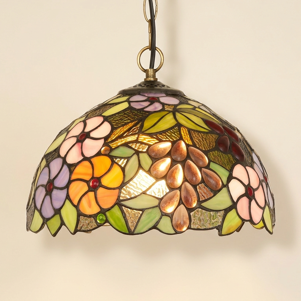 Bacchara, 12 Inch Tiffany-style stained glass pendant light, lit, on a plain ivory studio background