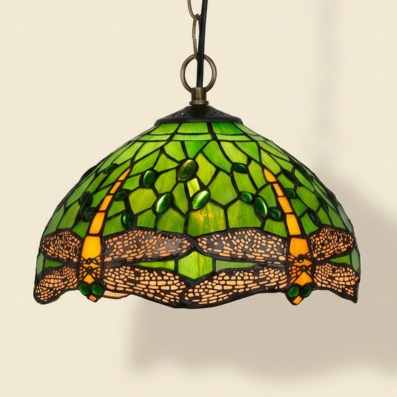 Odessa, 12 Inch - Green Tiffany-style stained glass pendant light, lit, on a plain ivory studio background