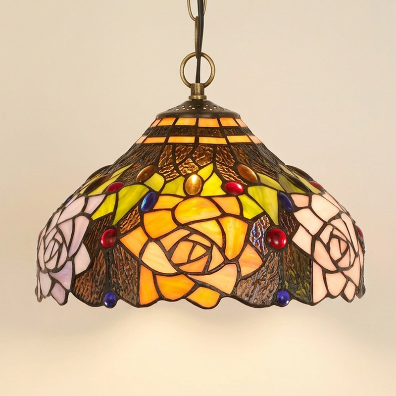 Norelle, 12 Inch Tiffany-style stained glass pendant light, lit, on a plain ivory studio background