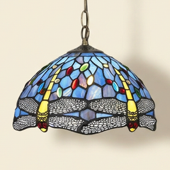 Odessa, 12 Inch - Blue Green Tiffany-style stained glass pendant light, lit, on a plain ivory studio background