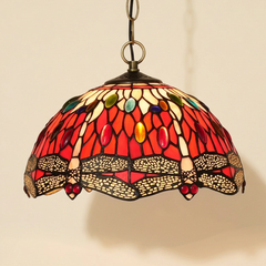 Odessa, 12 Inch - Red Tiffany-style stained glass pendant light, lit, on a plain ivory studio background