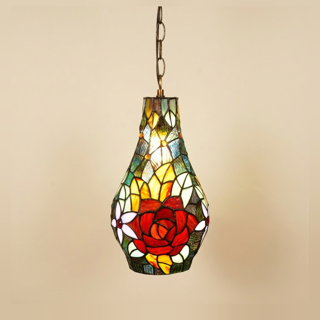 Rosabella, 7 Inch Tiffany-style stained glass pendant light, lit, on a plain ivory studio background