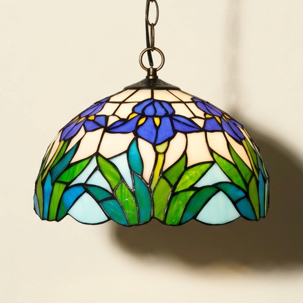 Iriselle, 12 Inch - Blue Tiffany-style stained glass pendant light, lit, on a plain ivory studio background