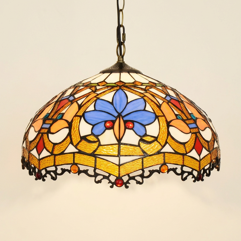 Draconis, 16 Inch Tiffany-style stained glass pendant light, lit, on a plain ivory studio background