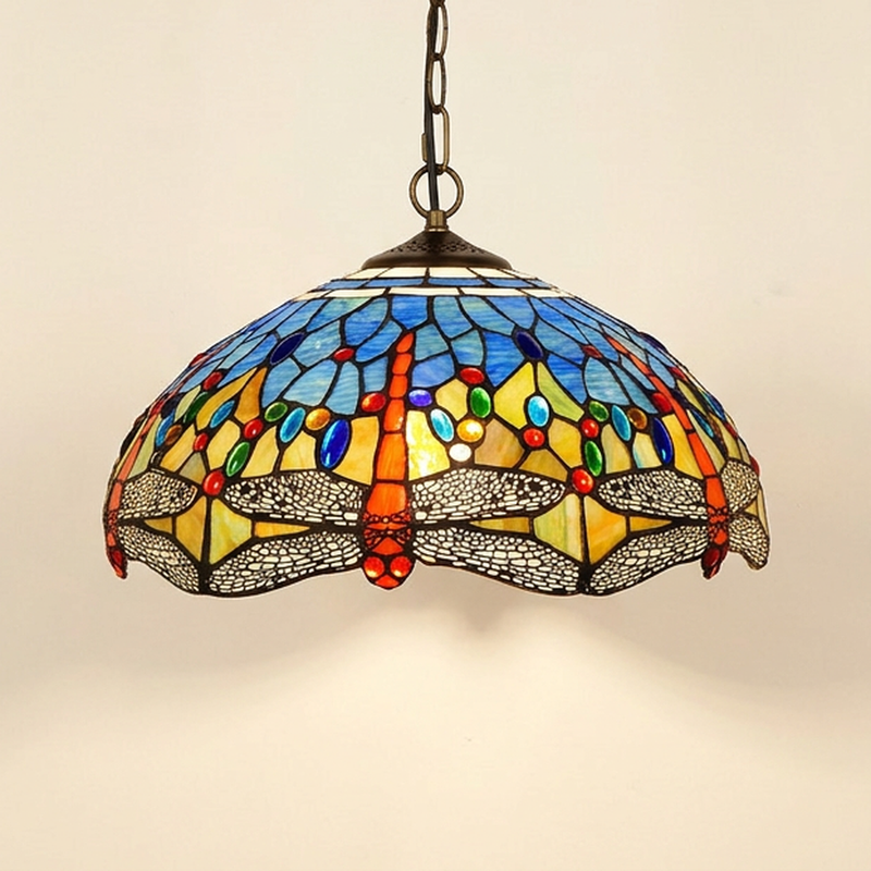 Odessa, 16 Inch - Blue Tiffany-style stained glass pendant light, lit, on a plain ivory studio background