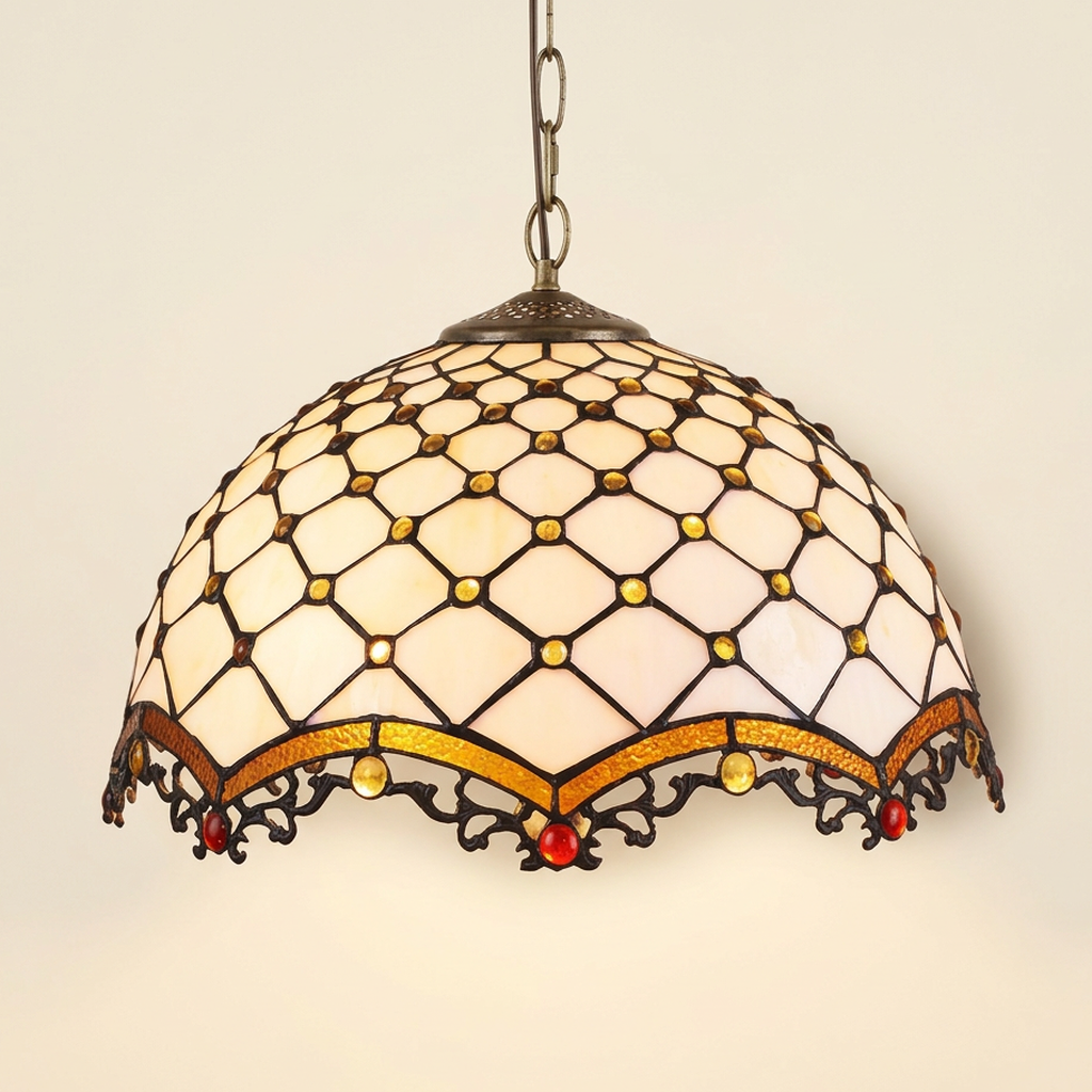 Berneau, 16 Inch Tiffany-style stained glass pendant light, lit, on a plain ivory studio background