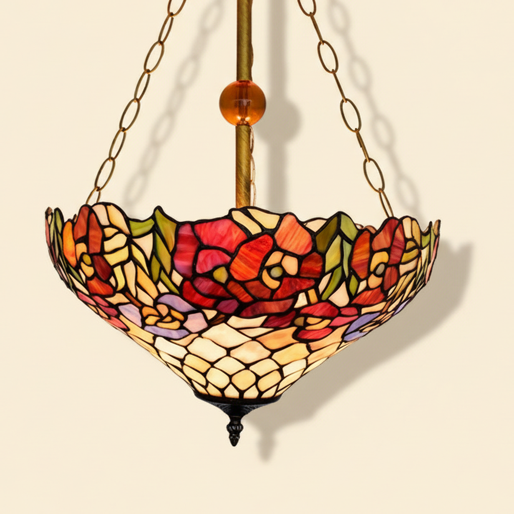 Clematine, 16 Inch Tiffany-style stained glass pendant light, lit, on a plain ivory studio background