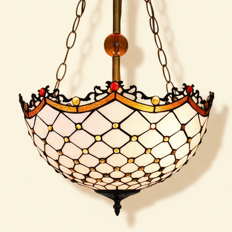 Bernelle, 16 Inch Tiffany-style stained glass pendant light, lit, on a plain ivory studio background