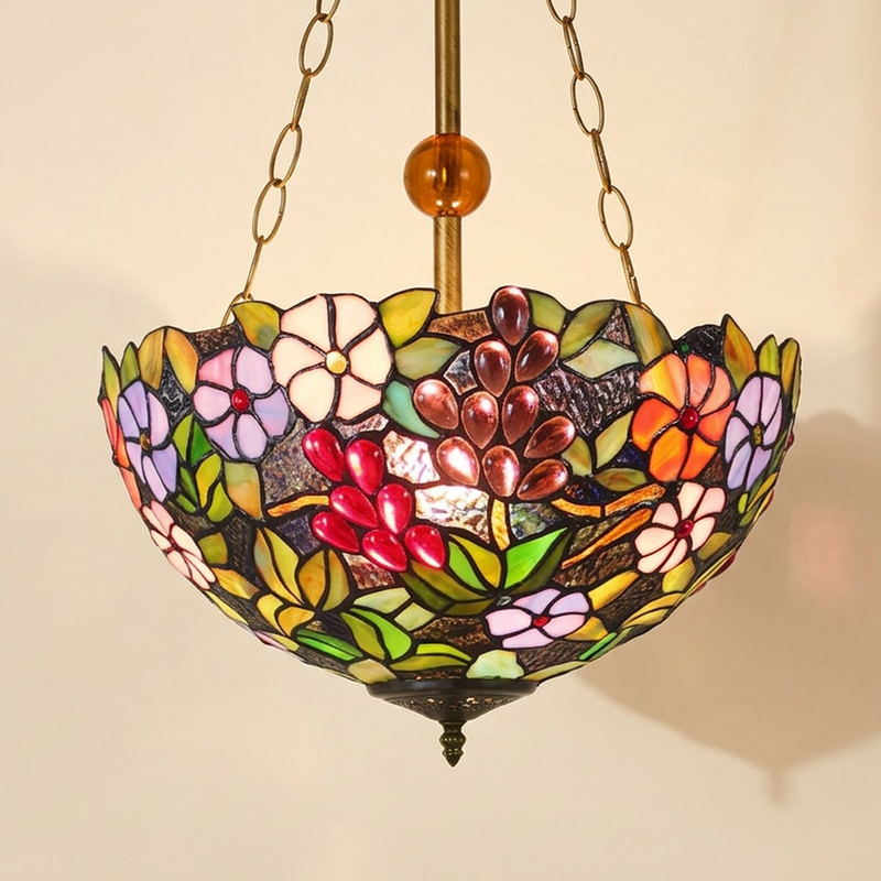 Vendine, 16 Inch Tiffany-style stained glass pendant light, lit, on a plain ivory studio background