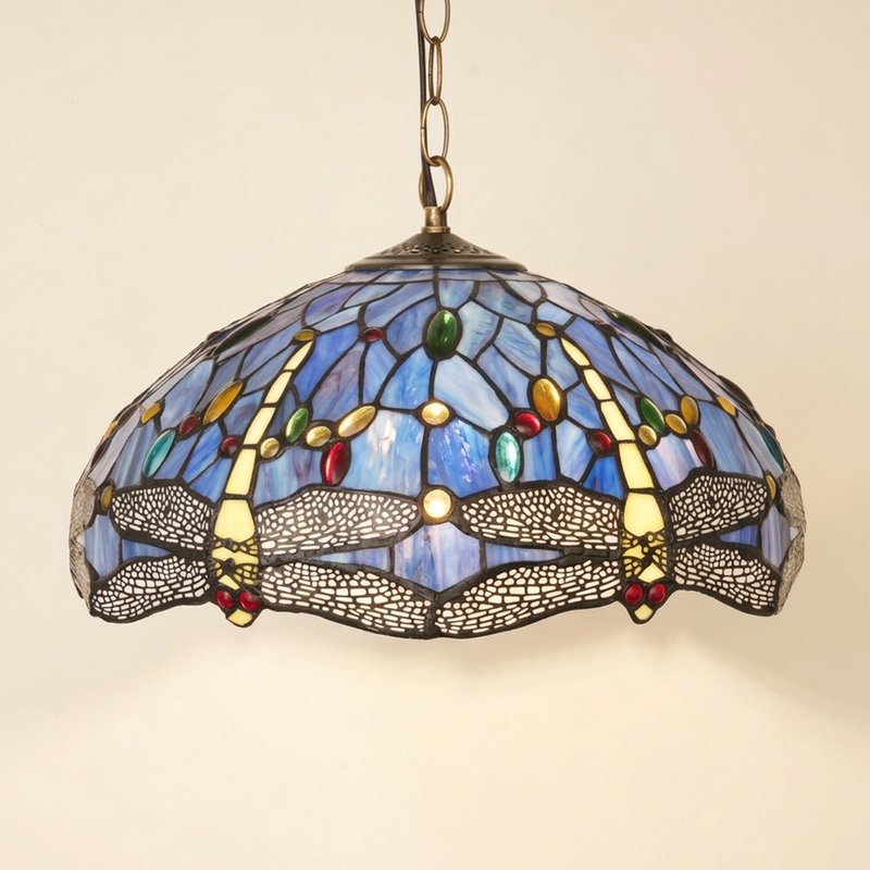 Zephyrine, 16 Inch Tiffany-style stained glass pendant light, lit, on a plain ivory studio background