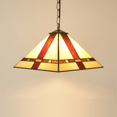 Amberton, 16 Inch - Yellow Tiffany-style stained glass pendant light, lit, on a plain ivory studio background