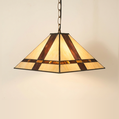 Amberton, 16 Inch - Red Tiffany-style stained glass pendant light, lit, on a plain ivory studio background