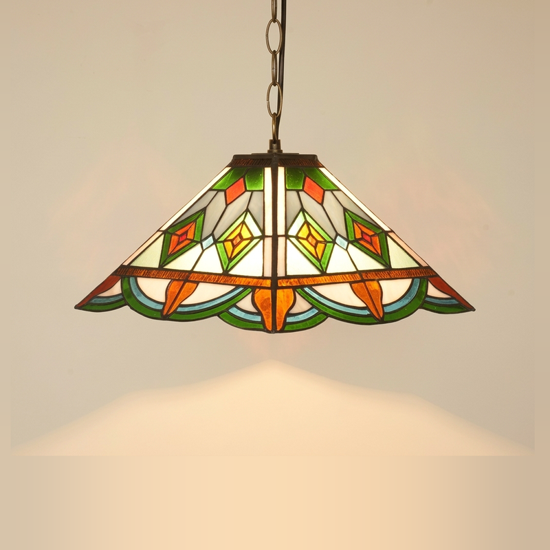 Verdmont, 16 Inch Tiffany-style stained glass pendant light, lit, on a plain ivory studio background