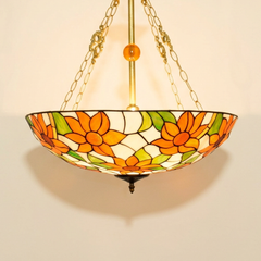 Heliose, 20-24 Inch - 24 Inches Tiffany-style stained glass pendant light, lit, on a plain ivory studio background