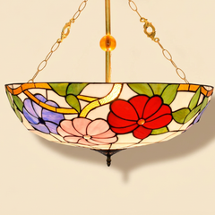 Auroria, 20-24 Inch - 24 Inches Tiffany-style stained glass pendant light, lit, on a plain ivory studio background