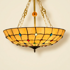 Bijou, 20-24 Inch - 24 Inches Tiffany-style stained glass pendant light, lit, on a plain ivory studio background