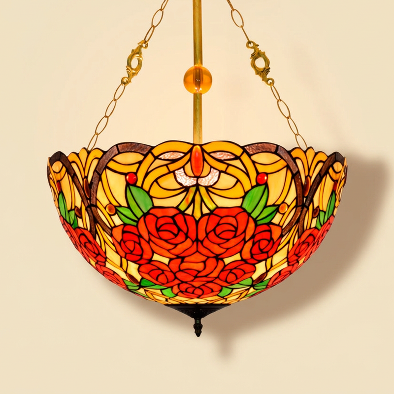 Perenne, 20 Inch Tiffany-style stained glass pendant light, lit, on a plain ivory studio background