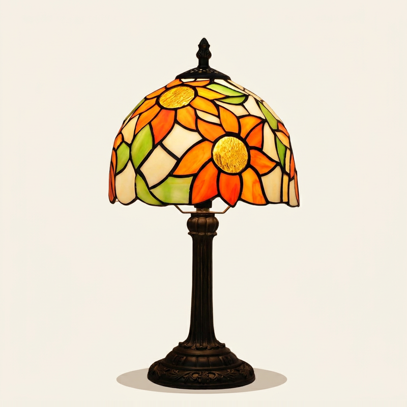 Solara 8 Inch Tiffany-style stained glass table lamp, lit, on a plain ivory studio background