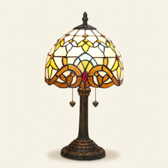 Marchesa 8 Inch Tiffany-style stained glass table lamp, Straight Pole base, lit, on a plain ivory studio background