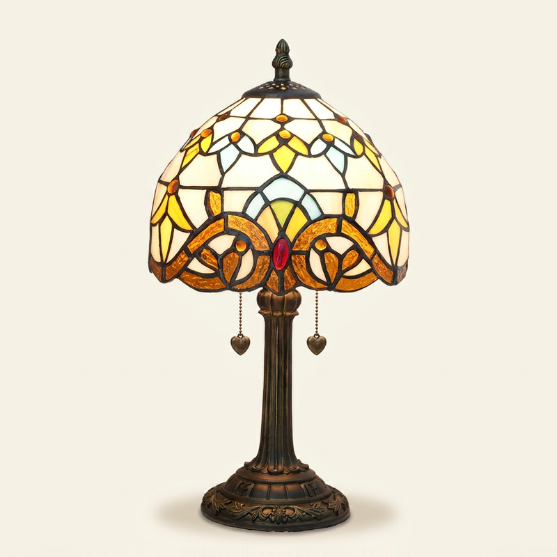 Marchesa 8 Inch Tiffany-style stained glass table lamp, Straight Pole base, lit, on a plain ivory studio background