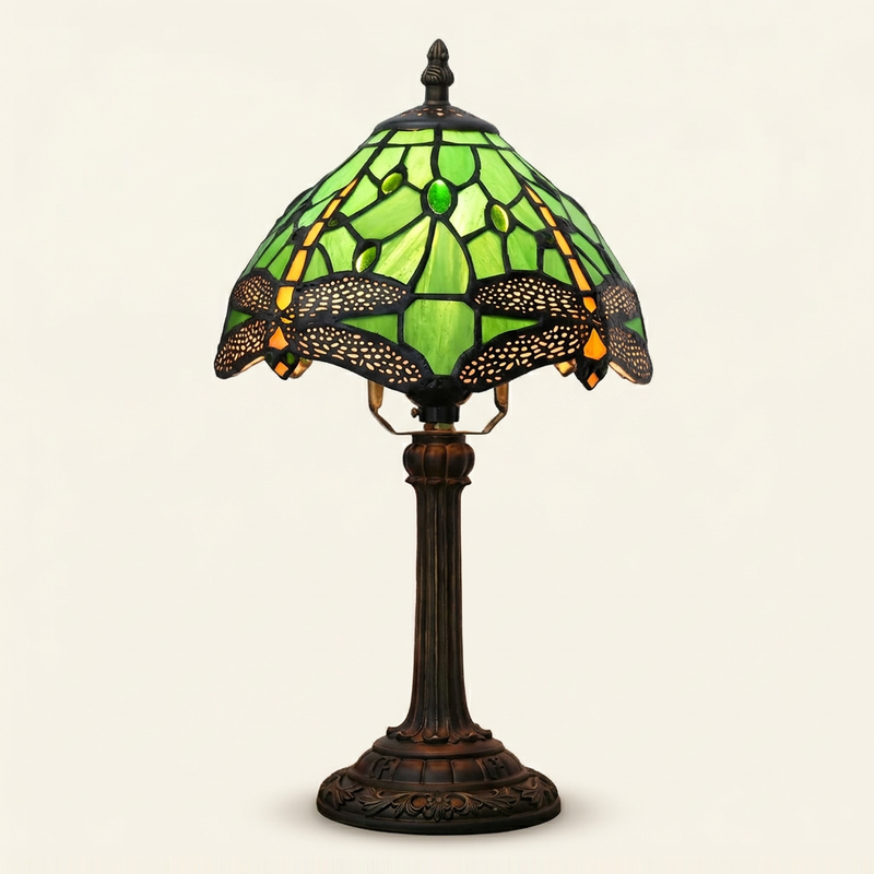 Verdis 8 Inch Tiffany-style stained glass table lamp, lit, on a plain ivory studio background