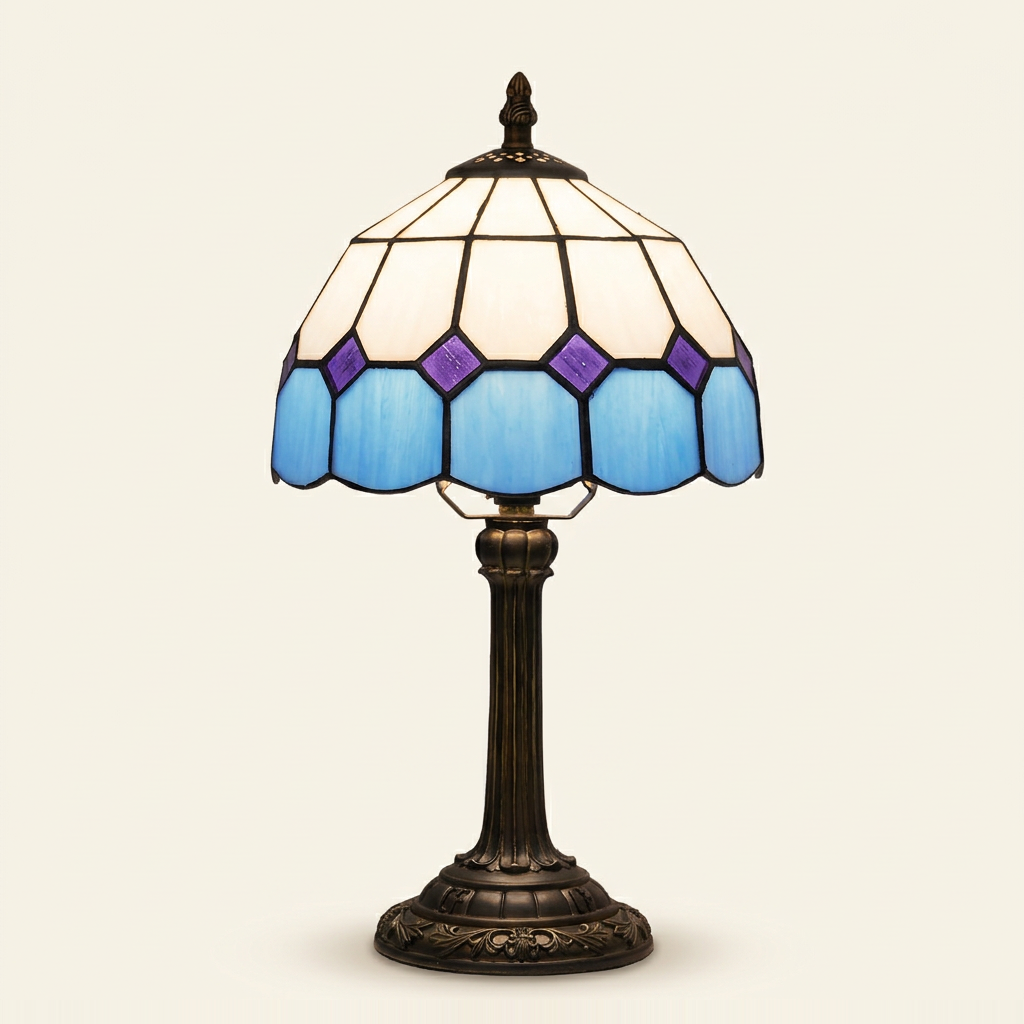 Ainsley 8 Inch Tiffany-style stained glass table lamp, Straight Pole base, lit, on a plain ivory studio background