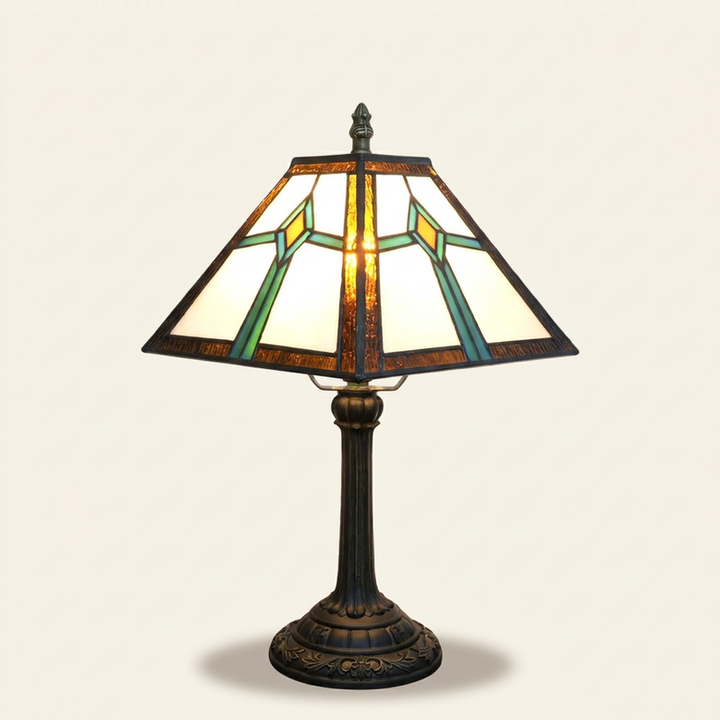 Excalis 11 Inch Tiffany-style stained glass table lamp, lit, on a plain ivory studio background
