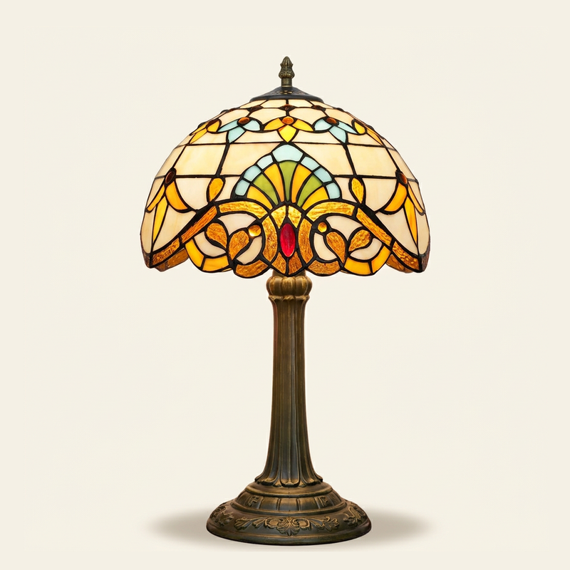 Aldreth 12 Inch Tiffany-style stained glass table lamp, Straight Pole base, lit, on a plain ivory studio background