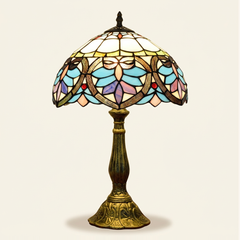 Amoria 12 Inch Tiffany-style stained glass table lamp, Curved Pole base, lit, on a plain ivory studio background