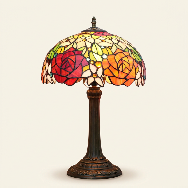 Rosalind 12 Inch Tiffany-style stained glass table lamp, Straight Pole base, lit, on a plain ivory studio background