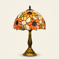 Helia 12 Inch Tiffany-style stained glass table lamp, Curved Pole base, lit, on a plain ivory studio background