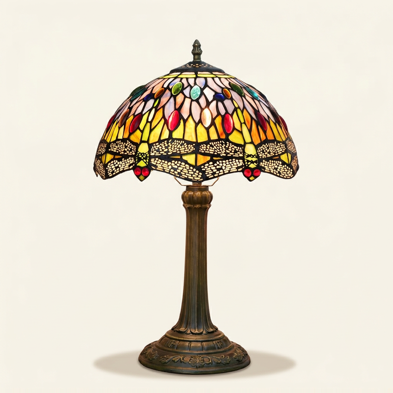 Perlune 12 Inch Tiffany-style stained glass table lamp, lit, on a plain ivory studio background
