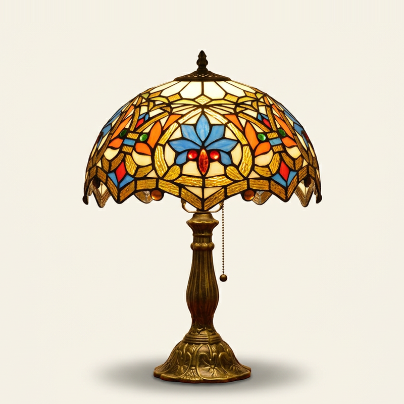 Seraphina 12 Inch Tiffany-style stained glass table lamp, lit, on a plain ivory studio background