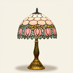 Tulippa 12 Inch Tiffany-style stained glass table lamp, Curved Pole base, lit, on a plain ivory studio background