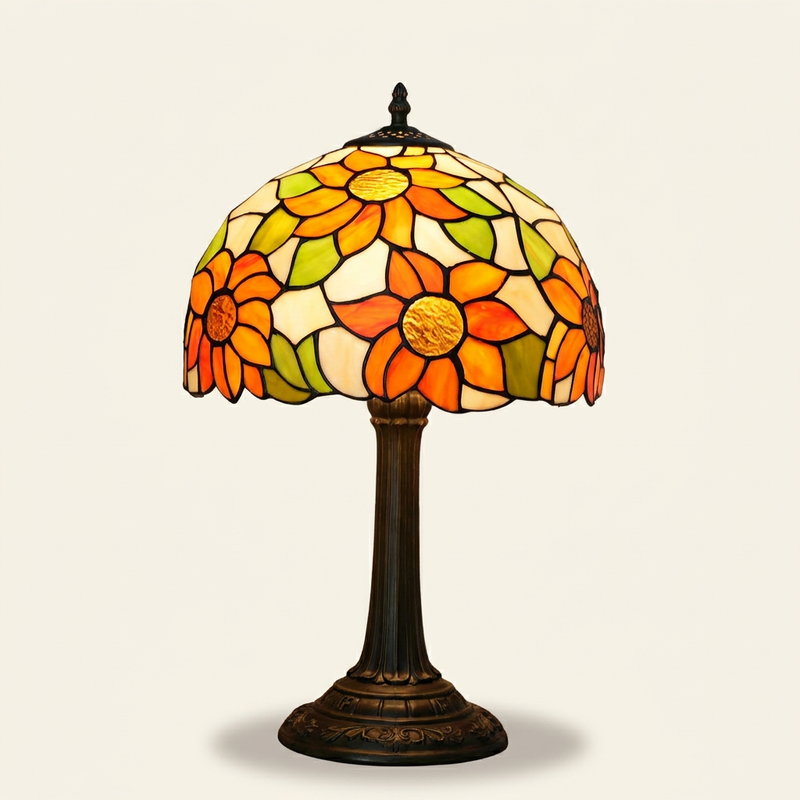 Helia 12 Inch Tiffany-style stained glass table lamp, Straight Pole base, lit, on a plain ivory studio background